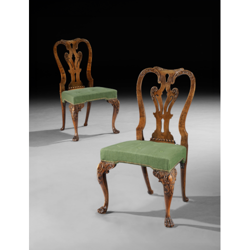 A FINE PAIR OF GEORGE II CARVED WALNUT SIDE CHAIRS